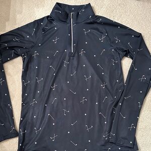 Lady Hagen Navy and White Pullover quarter zip with golf clubs/balls, golf shirt